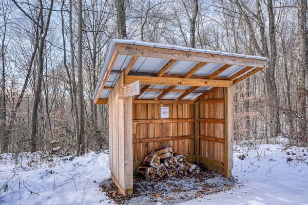 Snowy scene with the firewood shed