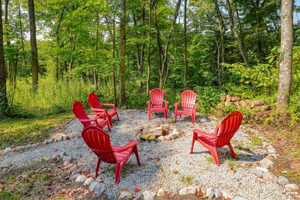 Fire pit with red chairs