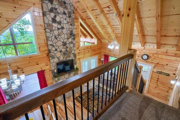 View down the stairs to the living room