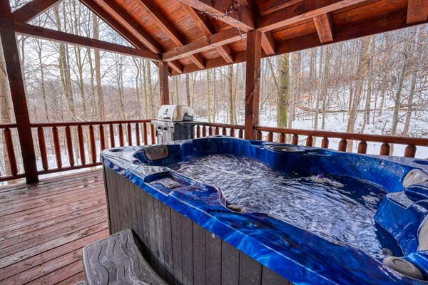 Hot tub bubbling on the covered deck