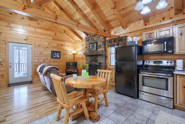 Kitchen with range and refrigerator