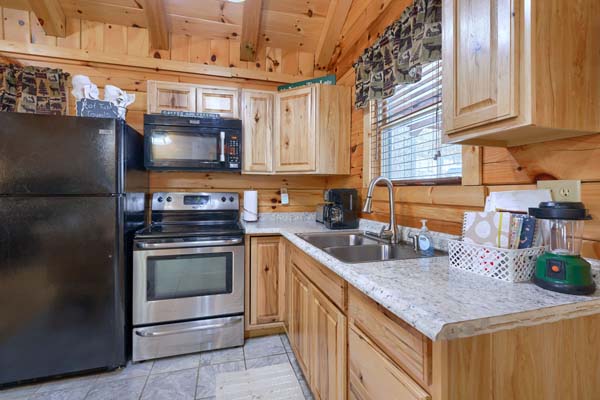 Kitchen with sink below the window
