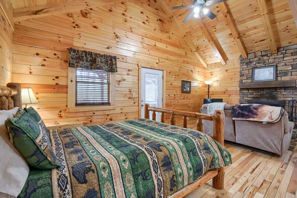 Sleeping area with large log bed
