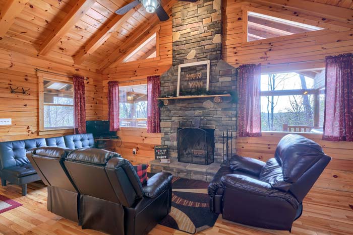 Living room with wood burning fireplace