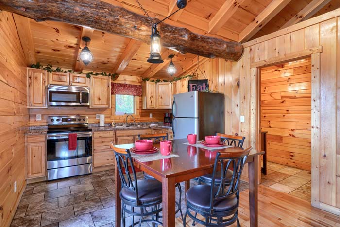 Cabin kitchen with wood cabinets