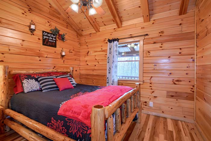 Bedroom with queen log bed