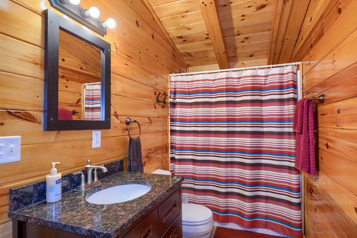 Bathroom with tub and shower