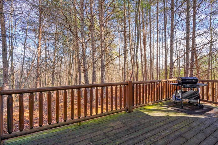 Deck with hot tub, grill and patio table