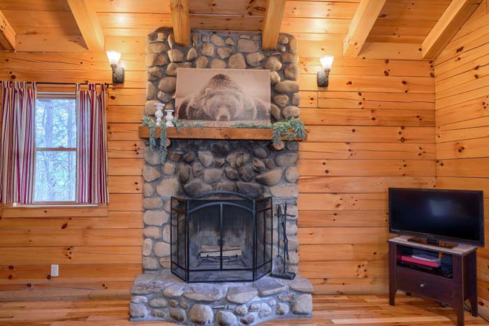 Stone fireplace with mantel