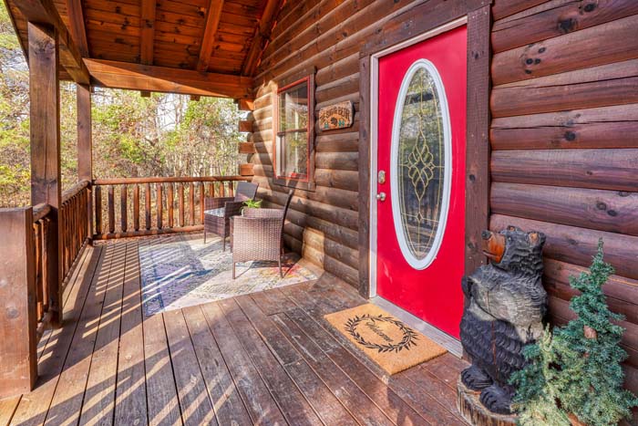 Red front door with oval glass